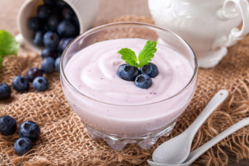 Yogurt with bilberry. Selective focus.
