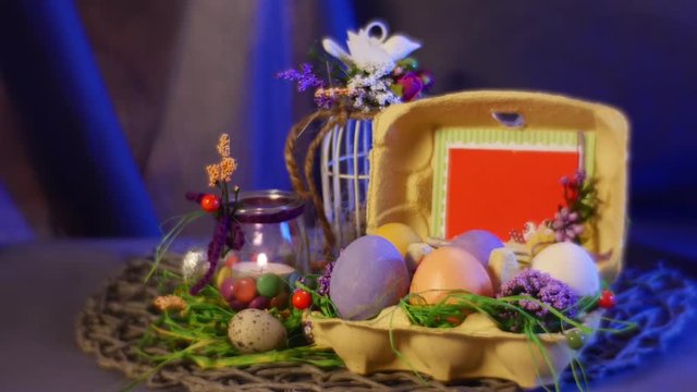 Easter Decor Egg Box With Beautiful Photo Frame Quail and Hen Eggs on a Table With Easter Gifts in Studio