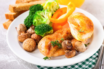Healthy lunch - chicken fillet, mushrooms, broccoli and paprika. Selective focus. Copy space