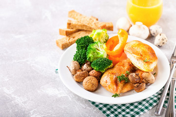 Healthy lunch - chicken fillet, mushrooms, broccoli and paprika. Selective focus. Copy space