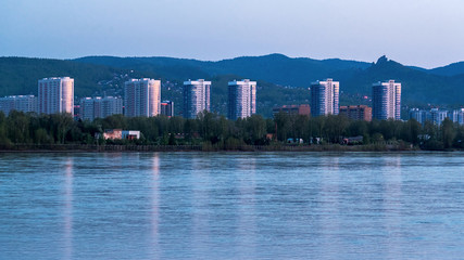 Obraz premium High-rise buildings on the banks of the Yenisei River in Krasnoyarsk