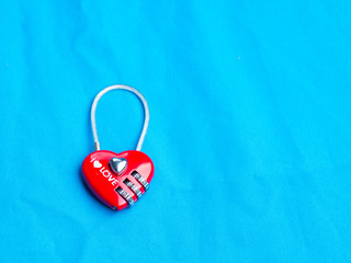 red heart shape of the key lock with encrypting numbers