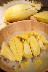 Sticky rice with durian and coconut milk sauce.