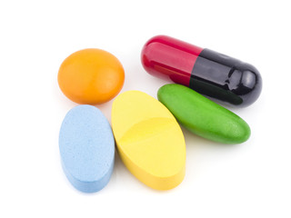 Super macro shot of Medicine: pills  or capsules on white background stack focus added