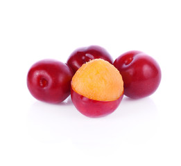 Red plum fruit isolated on white background.