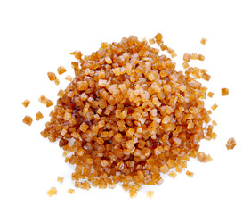 Heap of brown sugar isolated on white