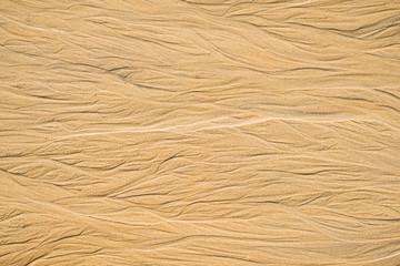 Sand texture. Sandy beach for background. Top view