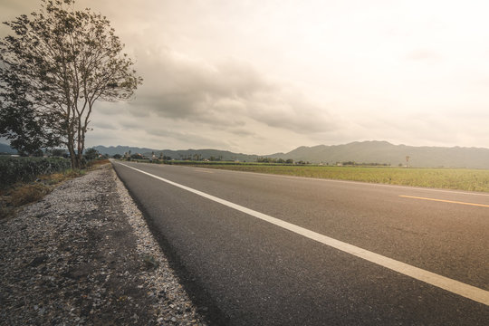 Road In Windy And Cloudy Day In Thailand