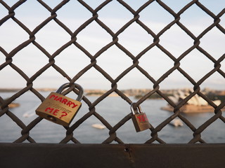 Fototapeta na wymiar Marry me locks on bridge
