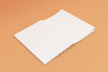 Mockup of blank white open brochure lying with cover upside on orange background