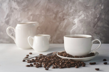 cup of coffee ,milk, sugar and coffee bean on white wooden background with loft wall style with light in concept relax time