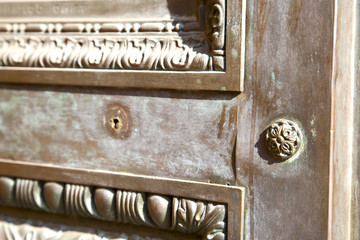 busto  rusty brass brown knocker in    wood italy  lombardy