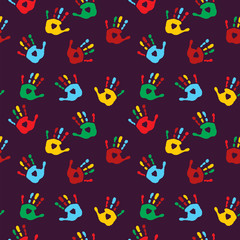 Stylish seamless background with different palm prints