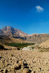 Fototapeta na wymiar in oman the old mountain gorge and canyon the deep cloudy sky