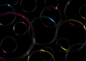 Colorful glossy glowing rings on black background
