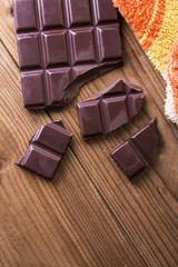Chocolate on wooden background