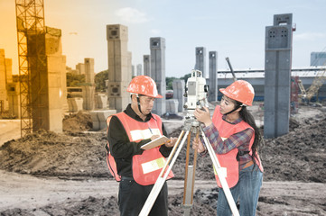 Surveyor or Engineer making measure on the building construction.