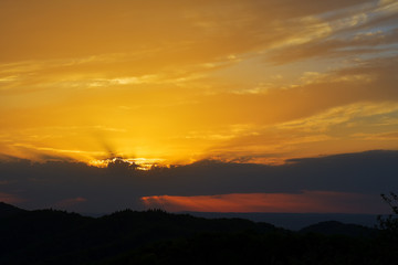 Evening and sunset on mountain hills of a romanian village