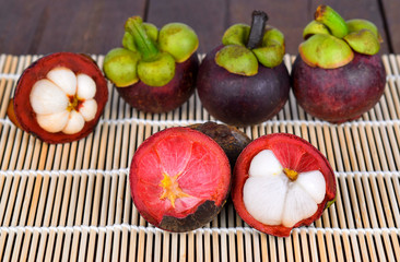 Mangosteen on wood
