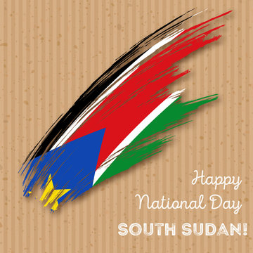 South Sudan Independence Day Patriotic Design. Expressive Brush Stroke in National Flag Colors on kraft paper background. Happy Independence Day South Sudan Vector Greeting Card.