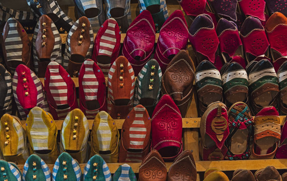 Typical colourful hand crafted leather slippers on display in the Fes Medina, Morocco