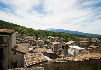 View of Etna volcano with a beautiful village Castiglione di Sicilia in the foreground. Italy.