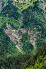 Fototapeta na wymiar Steep Ravine Down Alaskan Mountainside