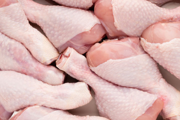 Fresh chicken leg,  meat on plate.With spices.