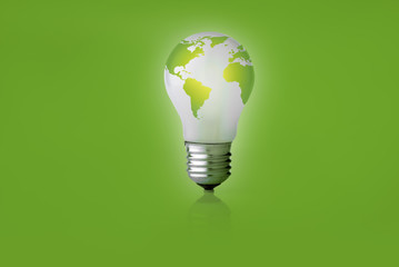 Energy saving light on a green background.