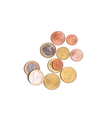 Many Euro coins isolated on white background