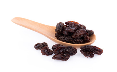 Dried raisin in wooden spoon on white background