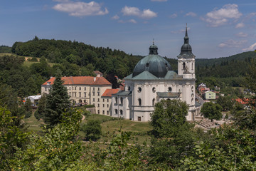 Fototapeta na wymiar Aerial view on Church, monastery in Krtiny, Czech Republic. Virgin Mary ,Baroque monument. Architecture , Jan Santini Aichel