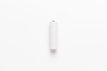 blank AA rechargeable battery over white background not isolated