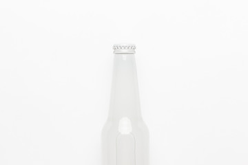 glass bottle of soda drink on white background. not isolated
