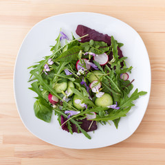 raw vegetables / Salad with different leaves, vegetables and flowers 