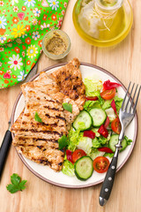 Grilled marinated turkey with fresh vegetables