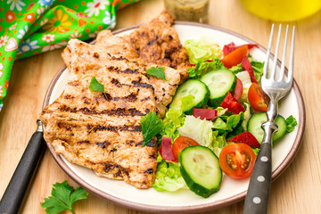 Grilled marinated turkey with fresh vegetables