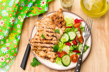 Grilled marinated turkey with fresh vegetables