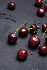 Cherry on a black background.