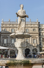 Statue of Madonna fountain on Piazza delle Erbe, Verona, Italy