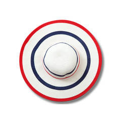 Pretty straw hat with shadow on white background. Beach hat top view isolated