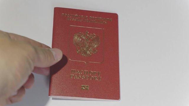 MOSCOW, RUSSIA, JUNE 3, 2017: Taking passport of the citizen of the Russian Federation. Passport is a document certifies the identity of its holder for the purpose of international travel.