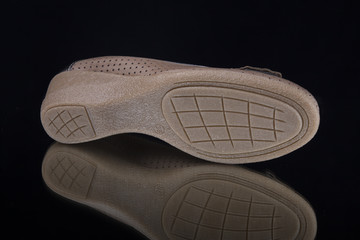 Female Brown Shoe on Black Background, Isolated Product, Top View, Studio.