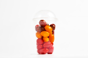 Cherry tomatoes in plastic container