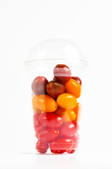 Cherry tomatoes in plastic container