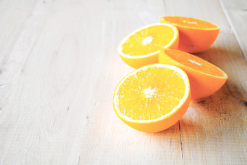Set of fruits, Slice of fresh oranges against on wood background.