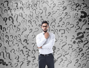 Thoughtful confused businessman