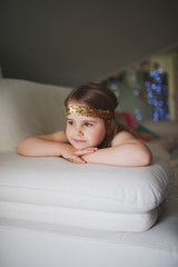 little girl lying and dreaming