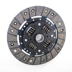 Сlutch disc for a passenger car isolated on the white background.