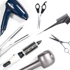 Various hair styling tools on white background